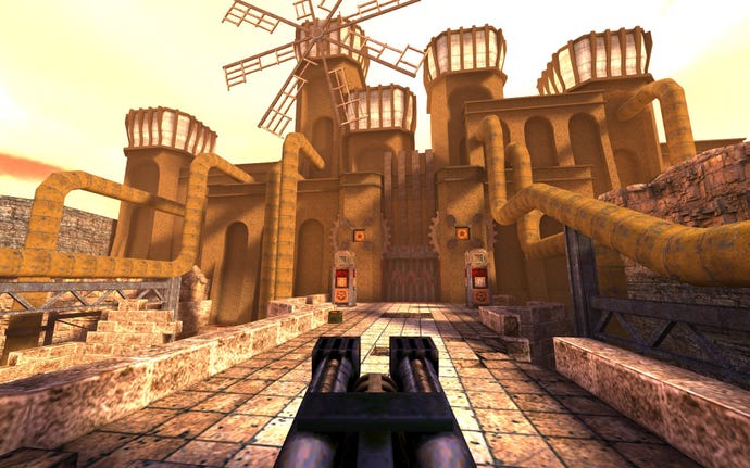 A castle structure with a windmill and several pipes coming out of it from Quake
